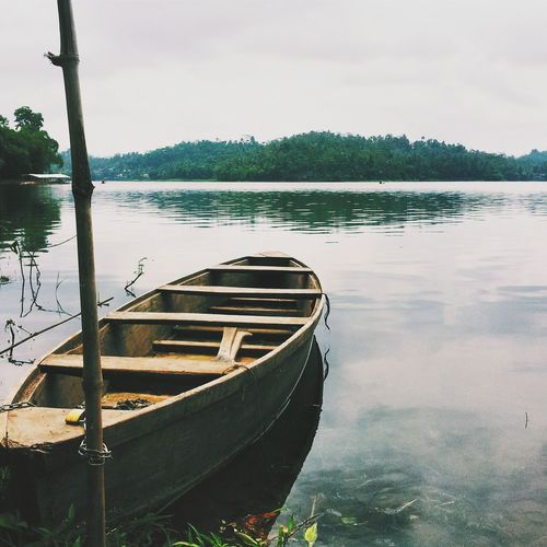 Boats in calm lake