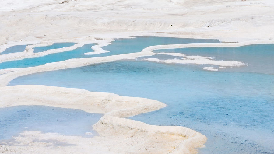 Natural travertine pools and terraces in pamukkale at turkey. 