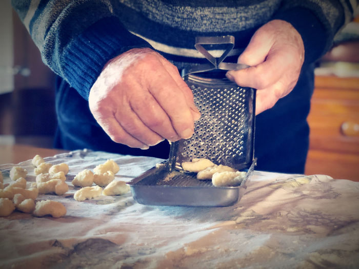 Man preparing food on table