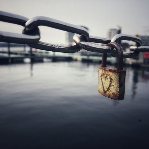 Close-up of padlock on chain