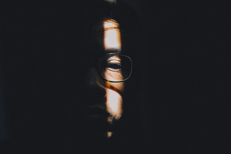 Portrait of man in shadow