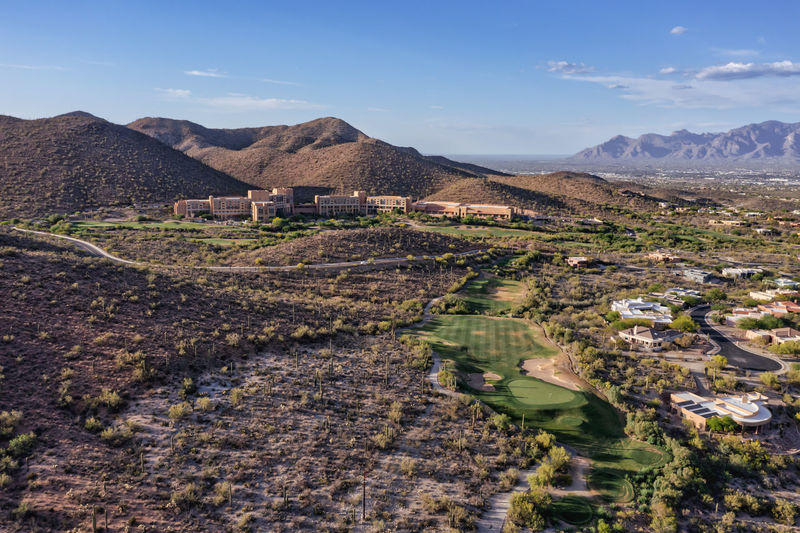 Tucson, arizona, usa. parched earth and green golf courses surround the jw starr pass marriott 