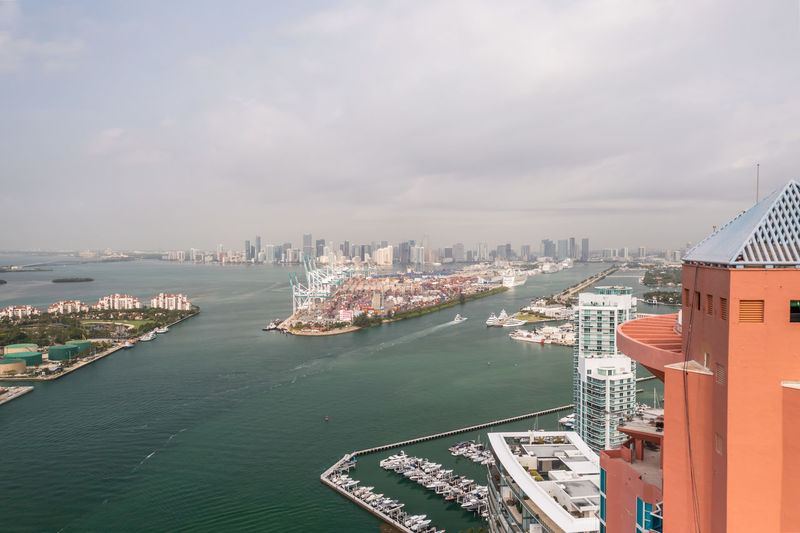 Beautiful aerial view overlooking dodge island and miami from behind highrise condos in miami beach.