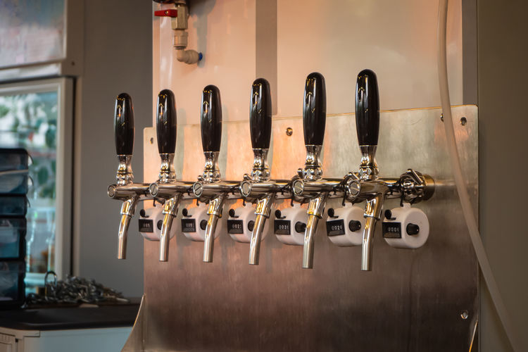 The craft beer taps in a pub