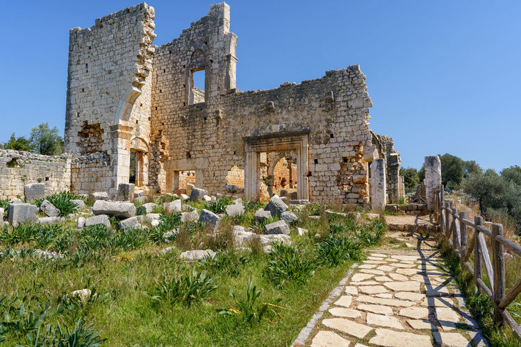 View of old ruins against clear sky