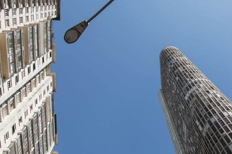 Low angle view of modern building against clear sky