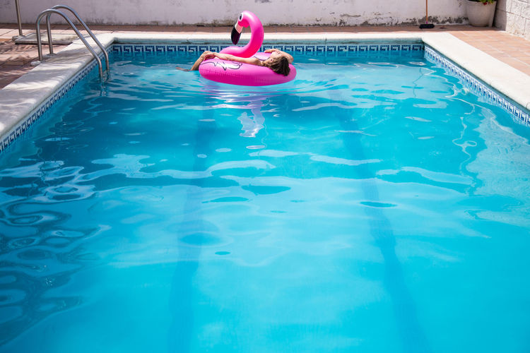 Woman swimming in pool