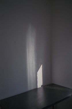 Sunlight falling on wall at home