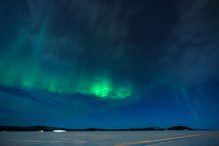 Low angle view of dramatic aurora sky at night