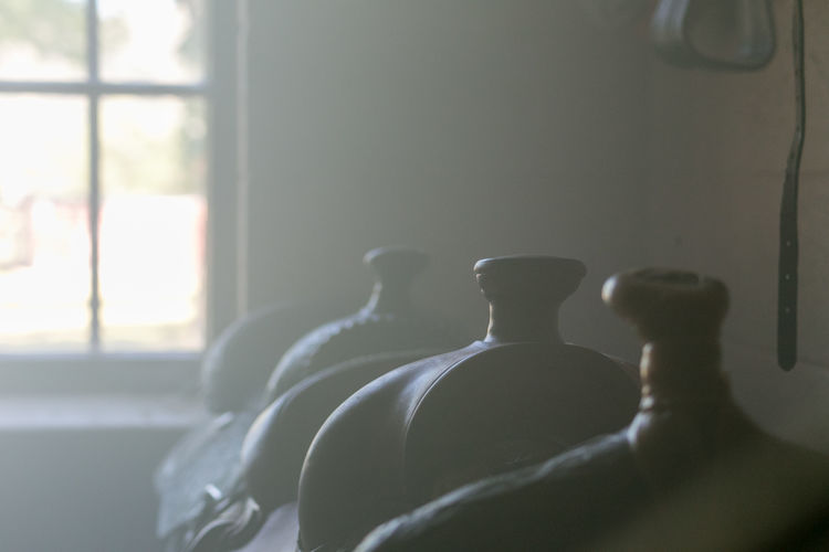 Close-up of bottle on table at home