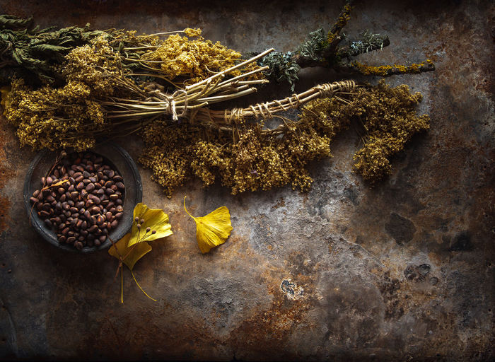 Dried tea and siberian pine nuts background
