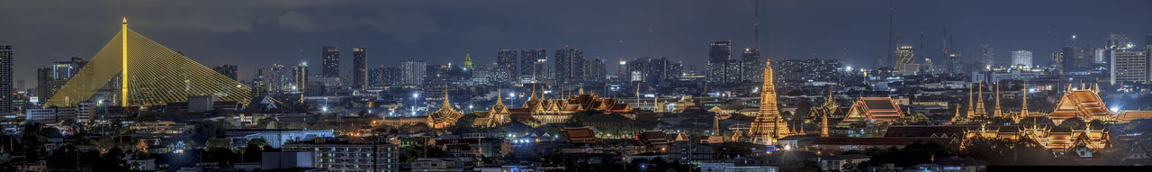 Bangkok night life with illuminated cityscape on skyscraper