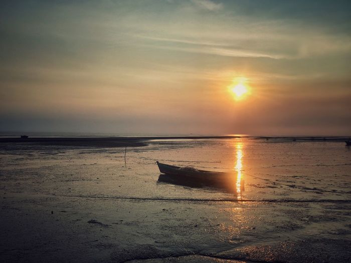 Scenic view of sea against sky during sunset