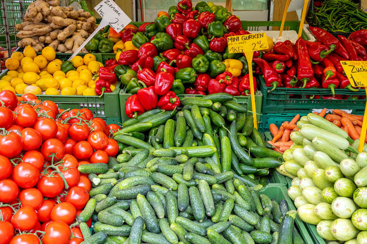 Colorful market stall with fresh vegetables for sale
