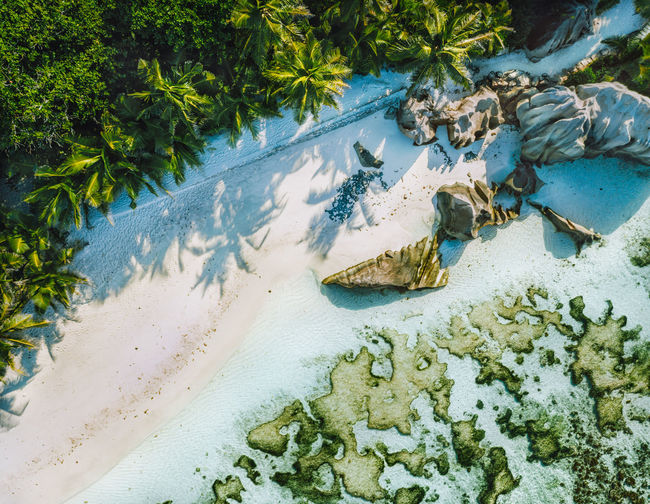 Aerial view of rocks at beach in island