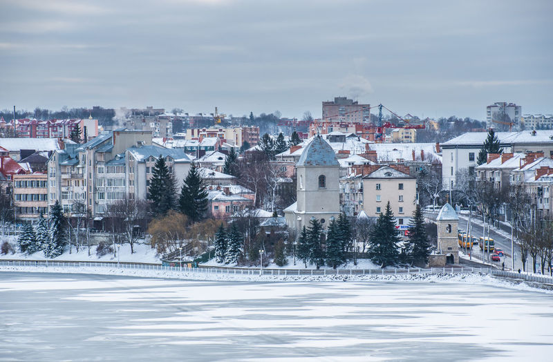 Panoramic view of ternopil pond and castle in ternopol, ukraine, on a snowy winter morning