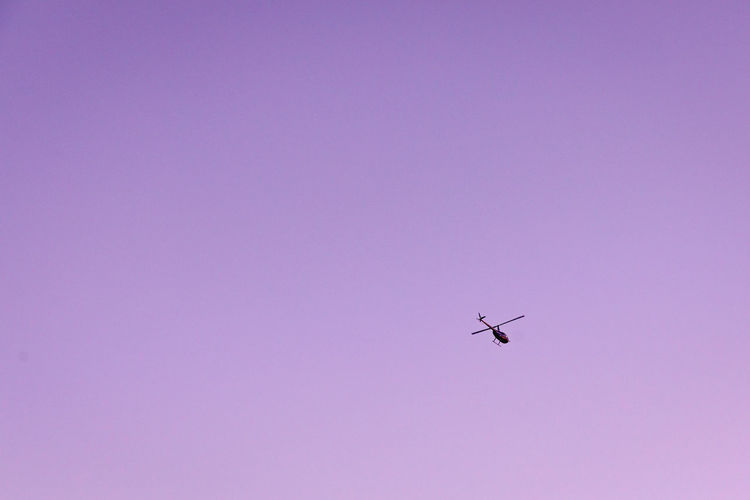 Low angle view of airplane flying in sky