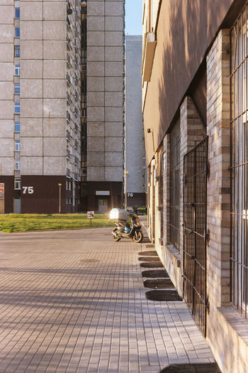 Alley amidst buildings in city