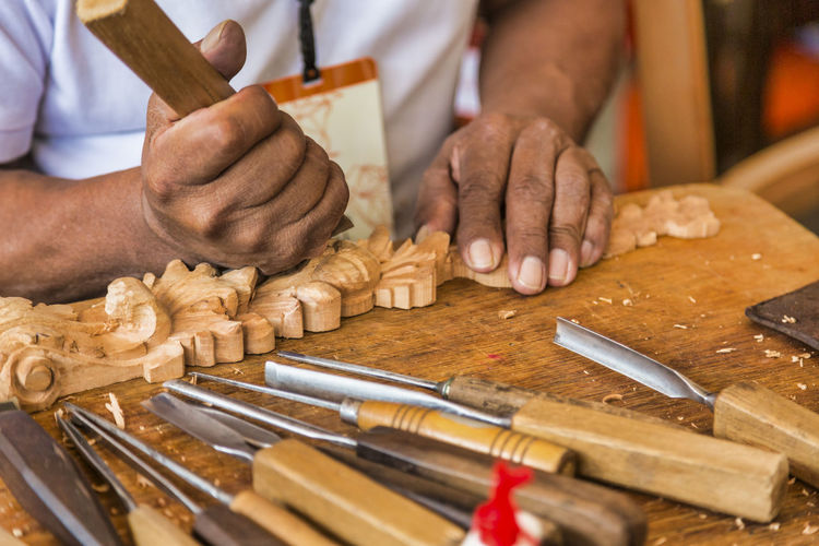 Close-up of man working on table