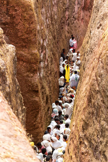 High angle view of people amidst rock formations