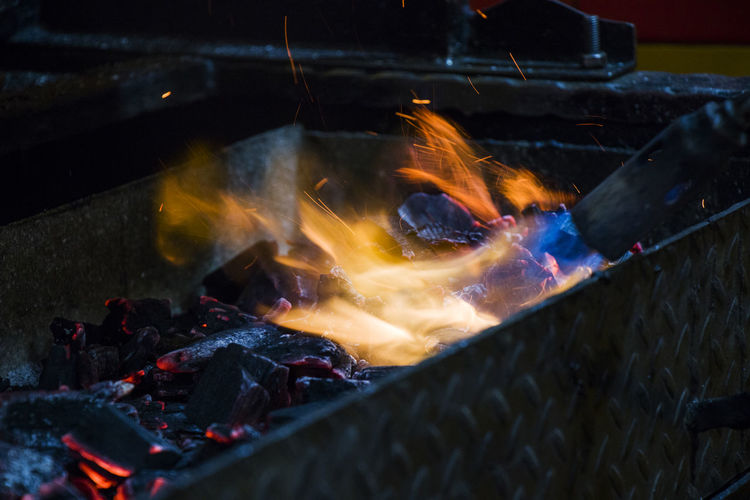 High angle view of bonfire on barbecue grill, gas fire