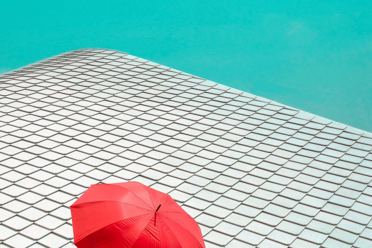 High angle view of umbrella in swimming pool