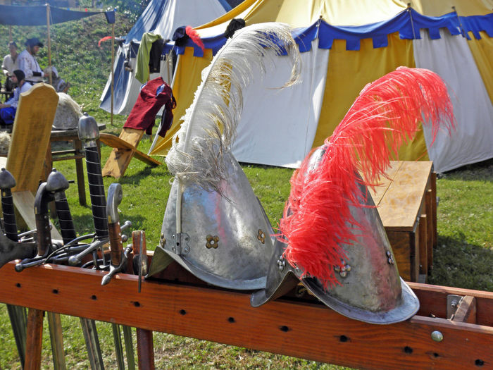 Antique helmets and swords at renaissance festival