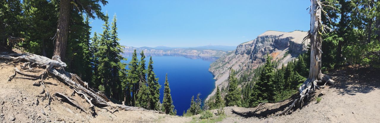 Panoramic view of crater lake against sky