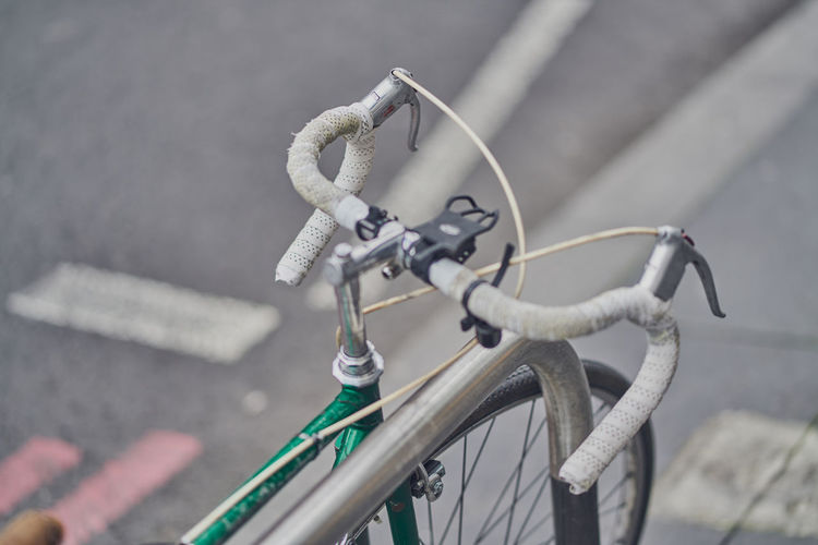 High angle view of a green racing bicycle on street in london. 