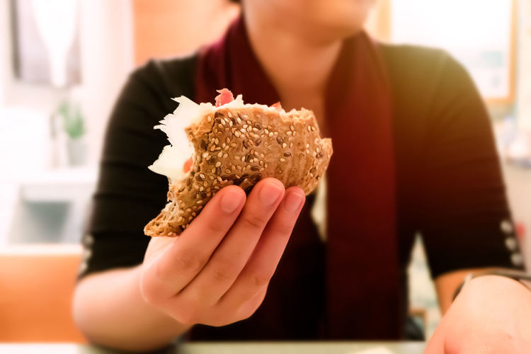 Close-up of woman holding ice cream