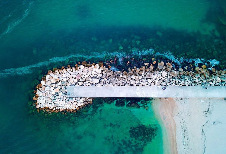 Aerial view of pier at sea