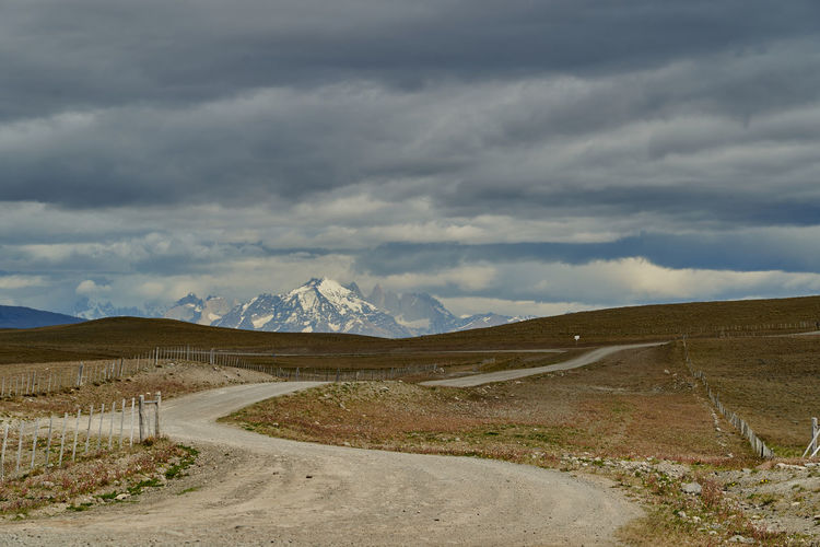 Vast open landscape in patagonia with snow covered mountains of the andes in the background. 