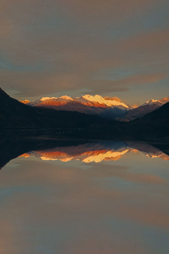 Scenic view of mountains against sky during sunset