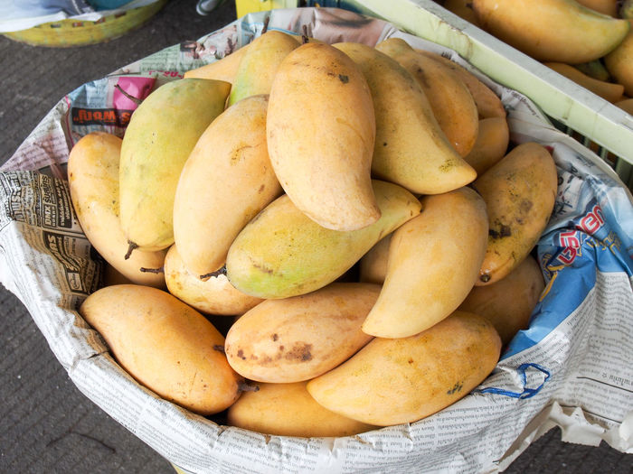 Mangoes in basket for sale at market