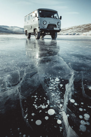 Rusian van over clean ice and bubbles