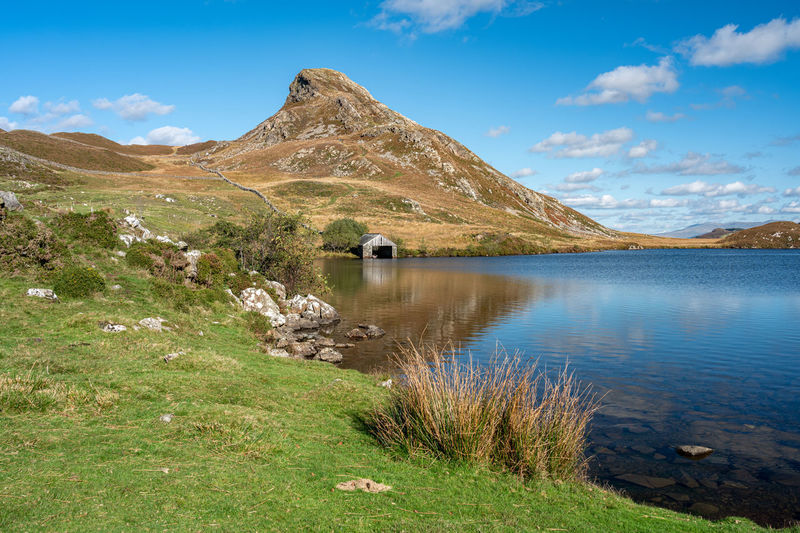 Pared y cefn-hir, and cregennan lake during autumn in the snowdonia national park, dolgellau, wales.