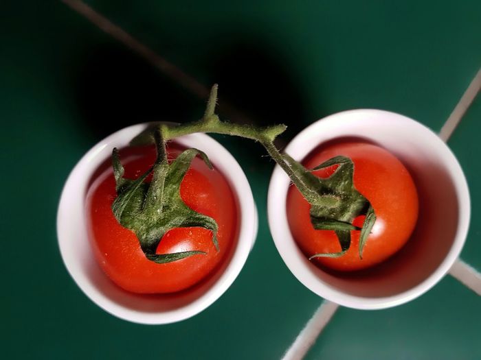 Close-up of fresh red tomato in eggcup