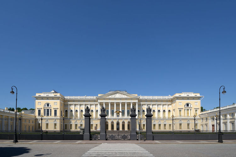 Facade of building against blue sky