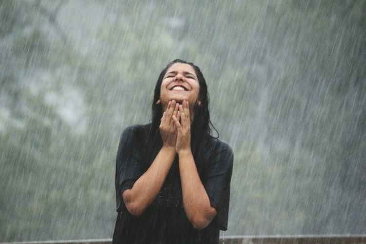 Young woman in rain