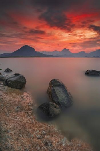 Scenic view of sea against sky during sunset