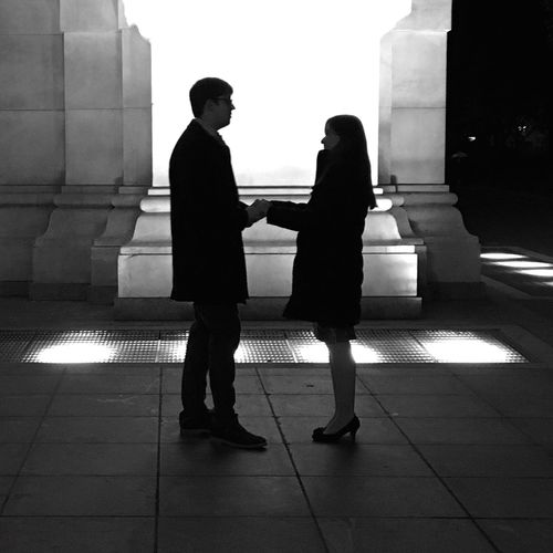 Full length of couple holding hands at washington square park
