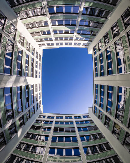 Low angle view of modern building against clear sky