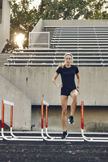 Athlete running at stadium