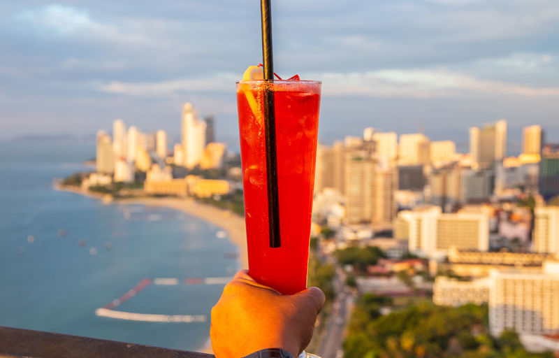 One singapore sling cocktail at a rooftop bar in thailand southeast asia