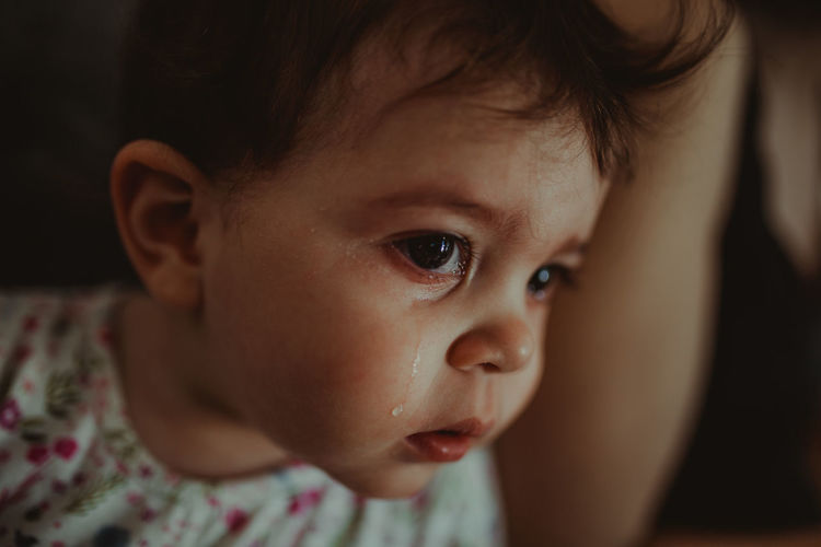 Close-up of baby girl crying