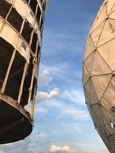 Low angle view of tower and balloon against sky