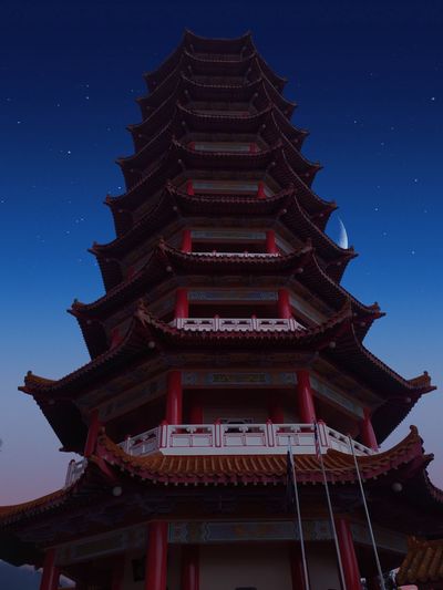 Low angle view of pagoda against sky