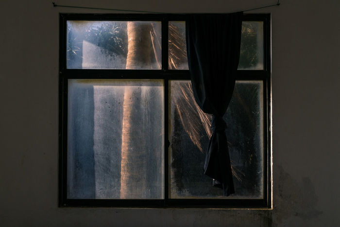 Curtain hanging on window