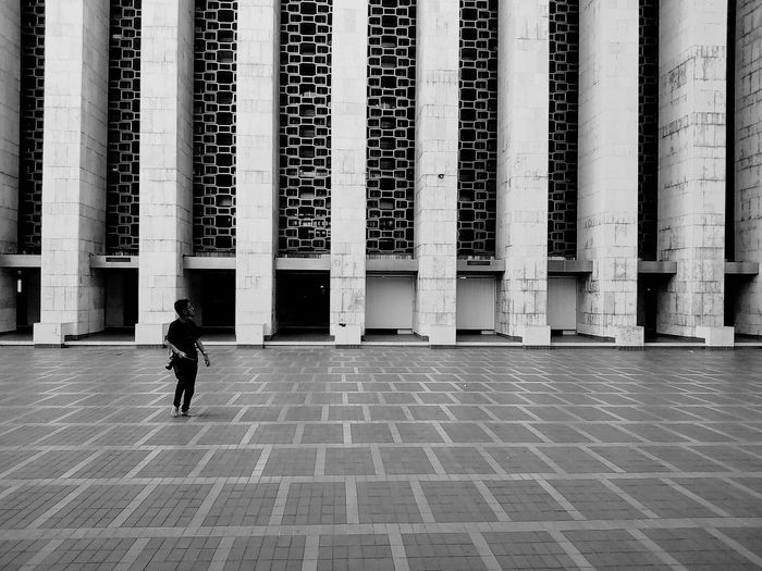 Woman standing in building
