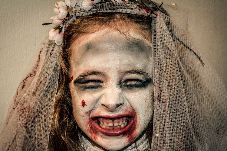 Close-up portrait of girl with make-up during halloween